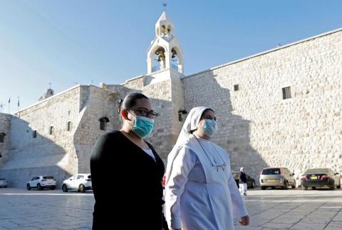 322 وفاة ونحو 48 ألف إصابة بفيروس كورونا في فلسطين