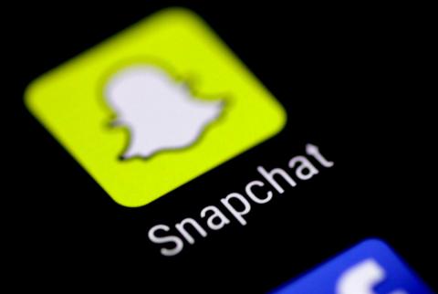تطبيق سناب شات-تصوير رويترز كارثة مالية بتصميم ’سناب شات’