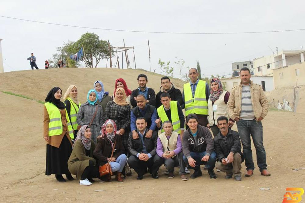 عدد من متطوعي جمعية حياة للعمل التنموي والتطوعي-أرشيفية ’حياة’ تنفذ حملة ’الدفا عفا’ بدعم من بنك القدس